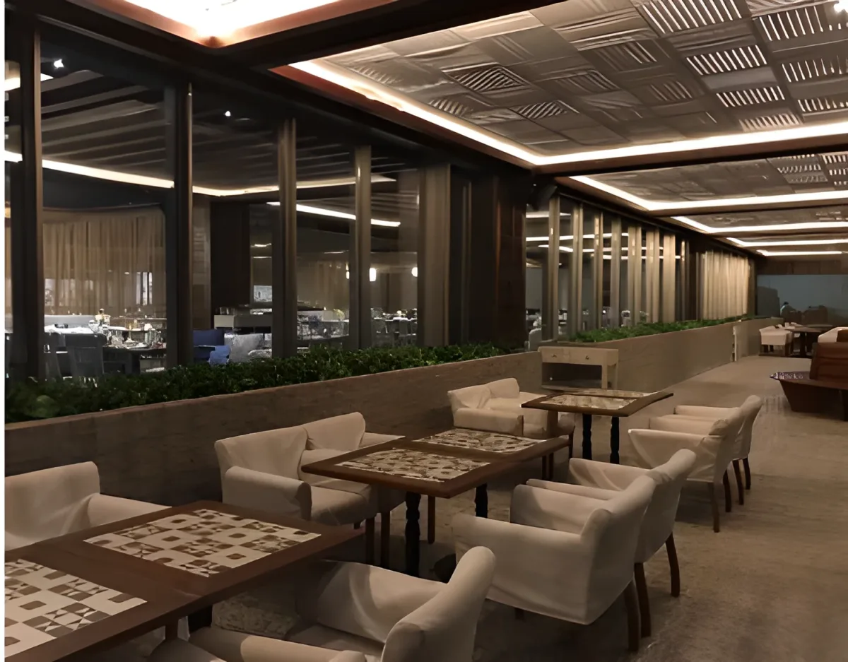 Wood grid ceiling with LED lighting in hotel lounge