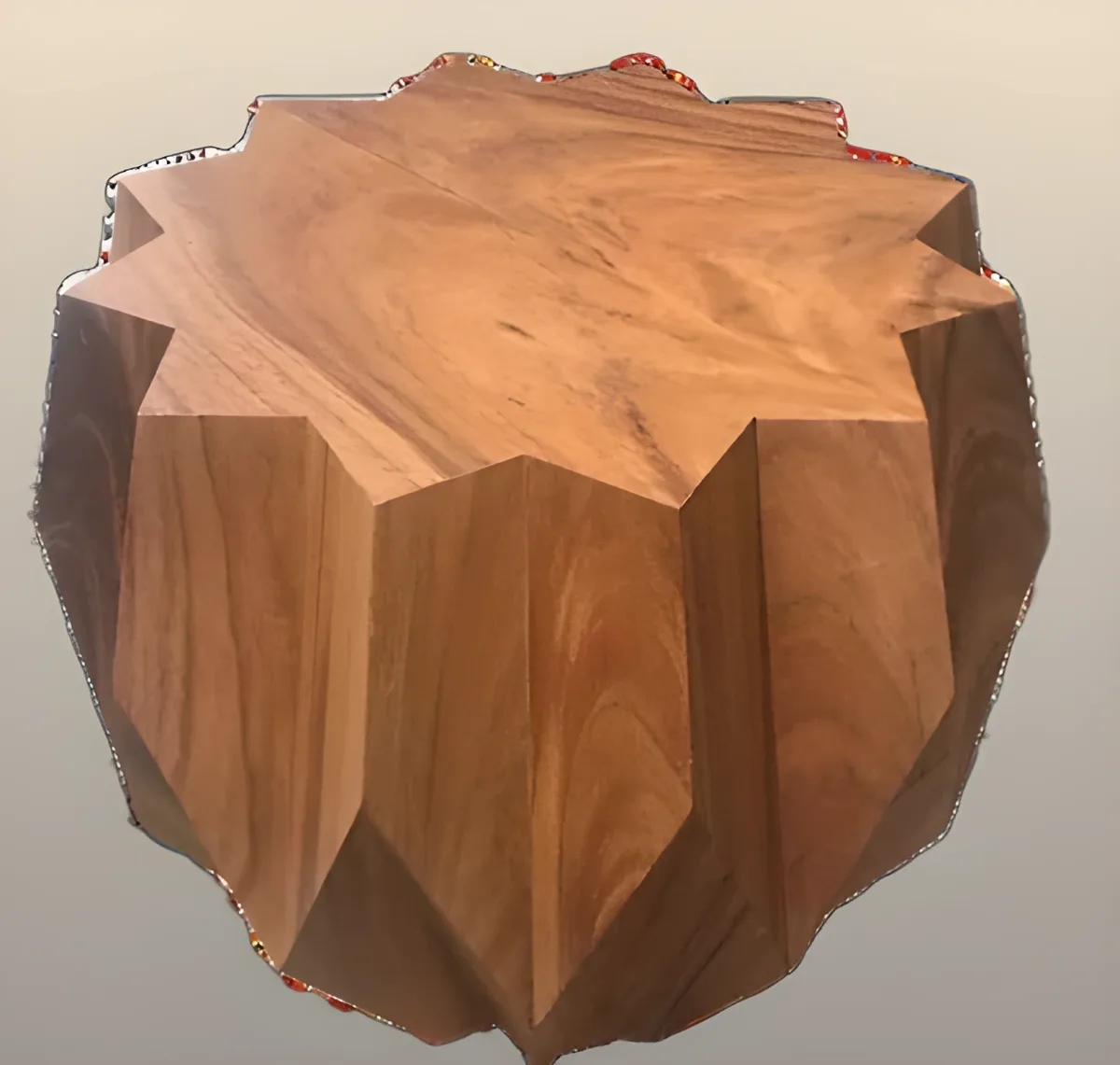 Star-shaped sculptural coffee table carved from solid wood