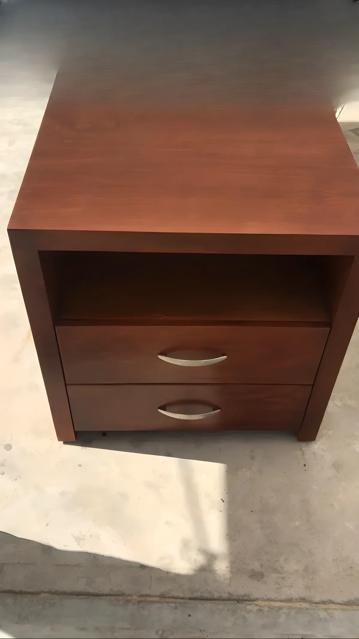 Classic mahogany nightstand with open niche and drawers