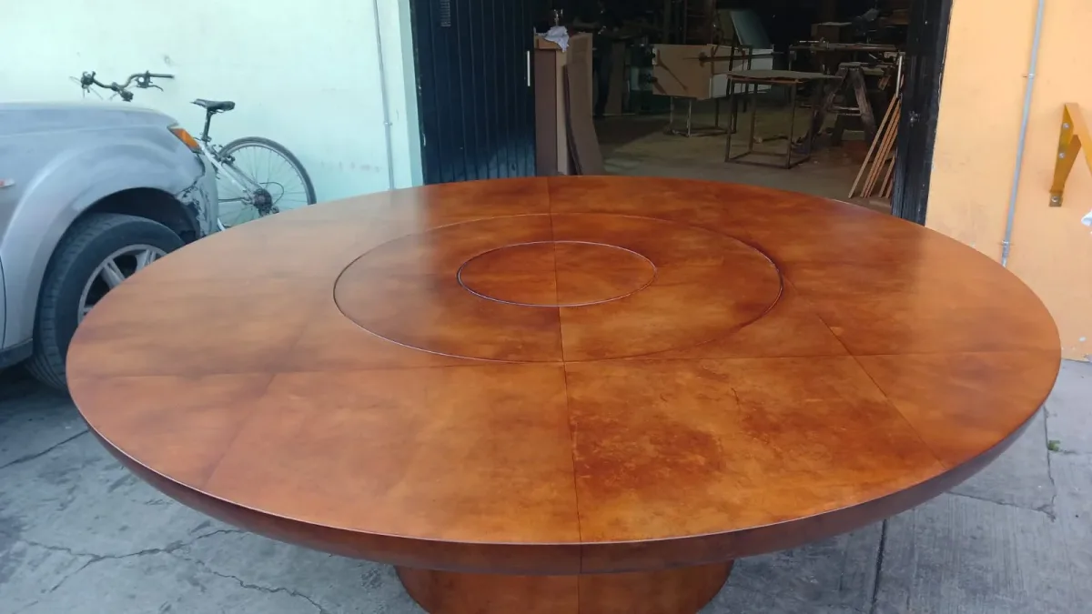 Detail of flush-mounted Lazy Susan on parchment table surface