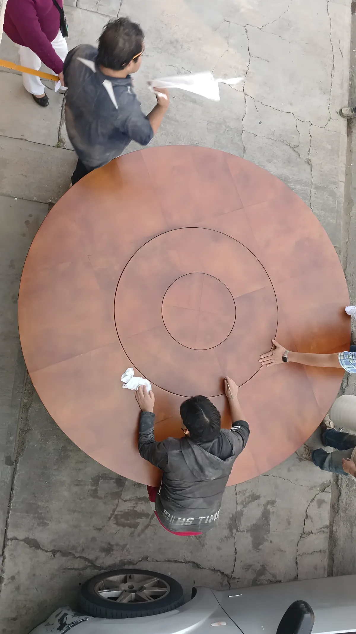 Zenithal view of monumental parchment round table for 20 people, custom corporate project