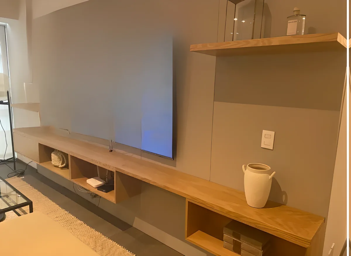Minimalist TV unit in light oak, floating Scandinavian design for modern bright spaces