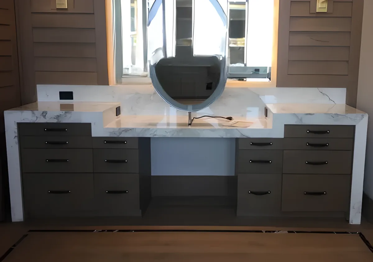 Luxury double vanity with Calacatta marble and oval mirrors with LED backlighting